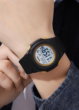 Skmei 2023bkgd-wt black-gold white 3