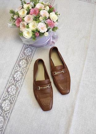 Шкіряні коричневі лофери intrend (max mara group) з пряжкою трензель