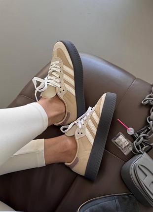 Adidas samba
beige / graphite platform 9