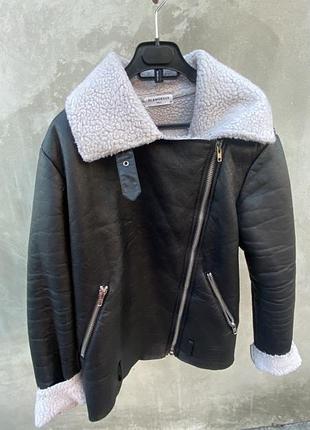 Жіноча шкіряна куртка дублянка