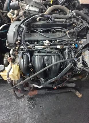 Двигатель мотор двигун мазда mazda 3 1 2.0 rf4m50 5 6