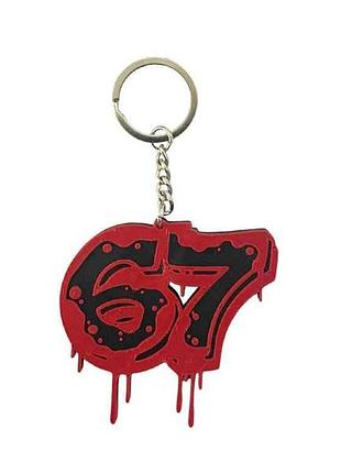 Брелок 6,5х6см пластик чорно-червоний 67 в стилі стріт-арт тм 3dsd