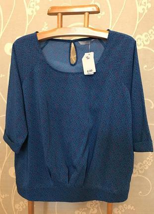 Очень красивая и стильная брендовая блузка.