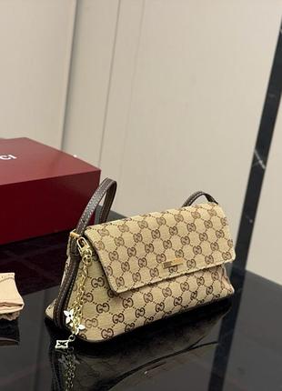 Жіноча маленька сумка елементи з натуральної шкіри gucci