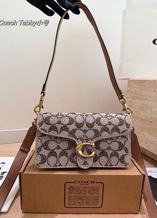 Жіноча сумка з шкіряними вставками та кристалами coach