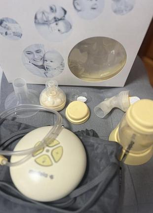 Електричний молоковідсмоктувач medela+смартсоска calma
