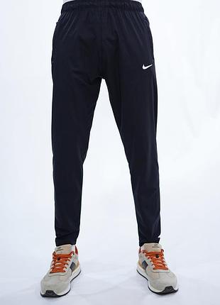 Чорні спортивні штани nike dri-fit (розмір m) з кишенями