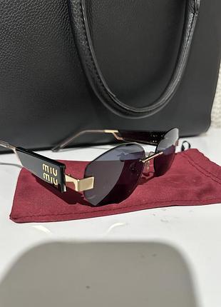 Окуляри miumiu