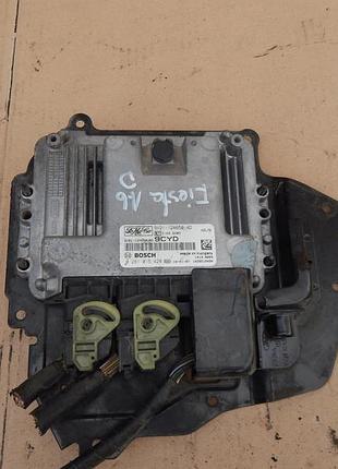Блок управления двигателем эбу а ford 9v21-12a650-ad