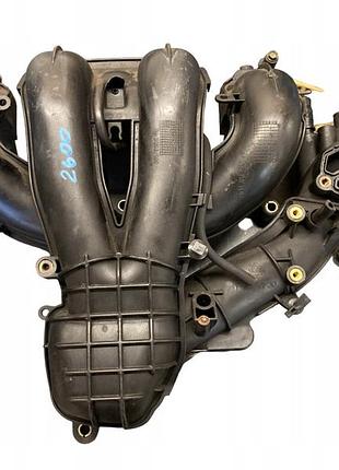 Впускний колектор 1s7g-9424-df mazda ford 1.8 2.0
