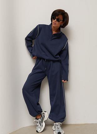 Теплий спортивний костюм з контрастним кантом