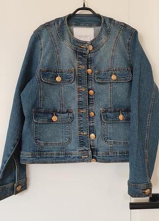 Джинсова жіноча куртка  calgary women's stretch cotton collarless denim jacket від amara reya