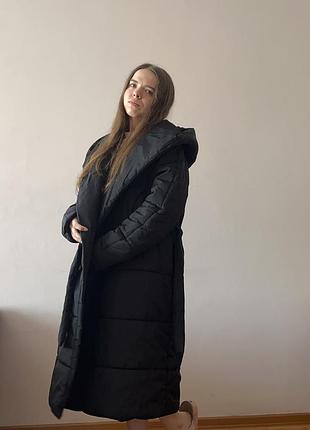 Довга жіноча зимова куртка
