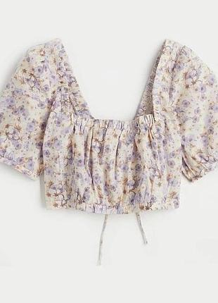 Короткий лляний топ від h&m з бузковим квітковим принтом та зав'язками ззаду