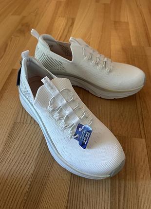 Білі жіночі кросівки skechers