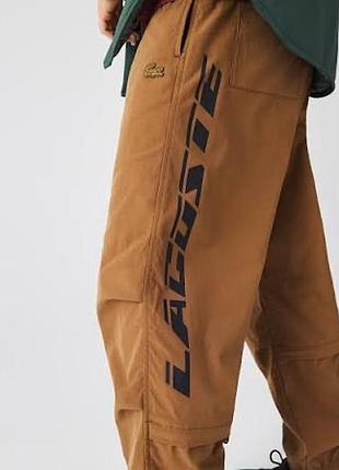 Салотивні штани унісекс  lacoste коричневі xs