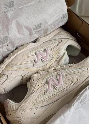 Кросівки new balance 204l у забарвленні sea salt з пастельно-рожевим логотипом