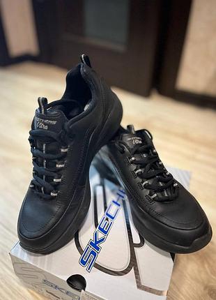 Skechers status black,