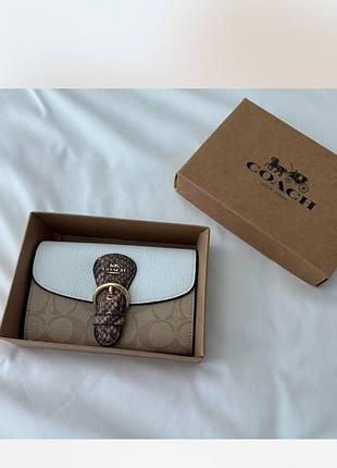 Гаманець coach бежевого кольору