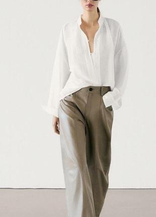 Massimo dutti брюки жіночі з натуральної шкіри в темно бежевому кольорі.