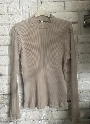 Гарна водолазка в рубчик від uniqlo