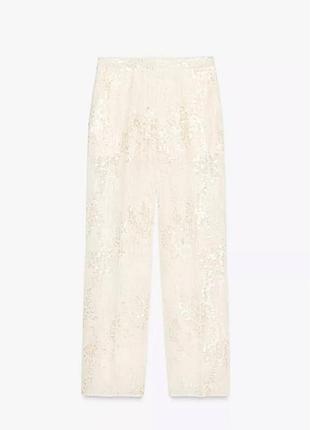 Брюки блискучі молочні zara 3