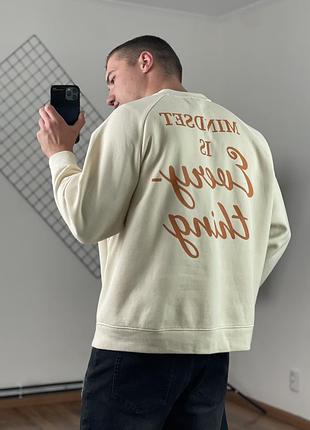 2452 / бежевий оверсайз світшот primark cares mindset is every thing