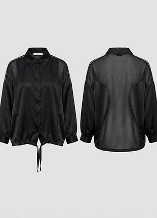 Блуза бренда na-kd с прозрачными сетчатыми вставками (mesh insert) и кулиской/завязками снизу.

оценка стоимости такой вещи зависит от