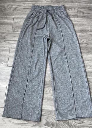 Сірі  теплі трикотажні штани вільного крою
