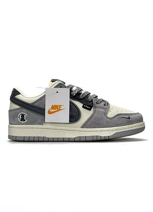 Nike sb dunk low x kaws grey beige 2