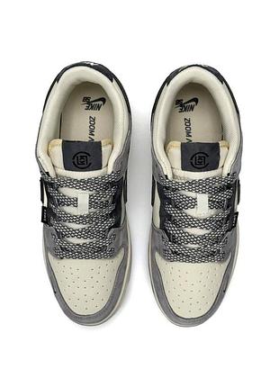 Nike sb dunk low x kaws grey beige 7