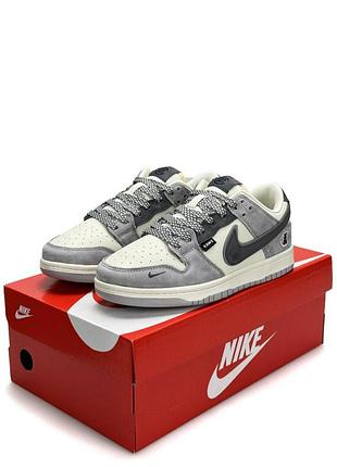 Nike sb dunk low x kaws grey beige 8