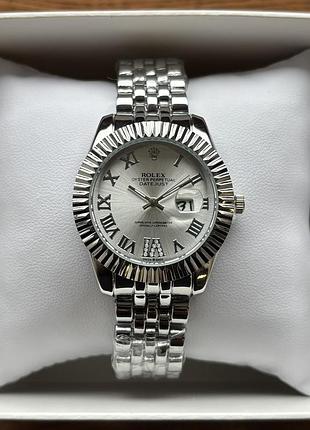 Хит! женские часы на браслете rolex серебристого цвета со светлым циферблатом