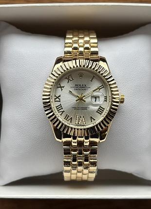 Хит! женские часы на браслете rolex золотого цвета со светлым циферблатом