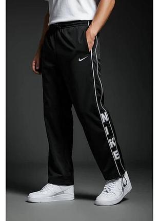 Штани чоловічі спортивні плащевка з принтом nike
