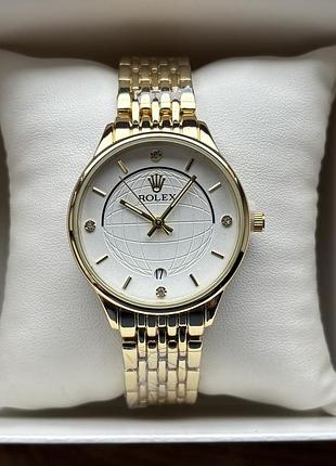 Топ! жіночий годинник на браслеті rolex золотого кольору