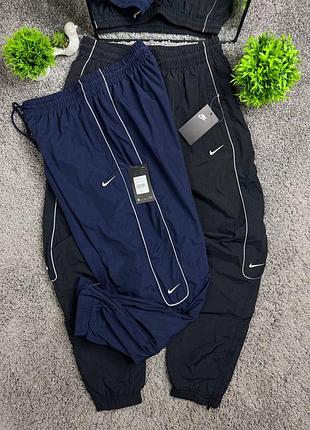 Нейлонові штани nike reflective