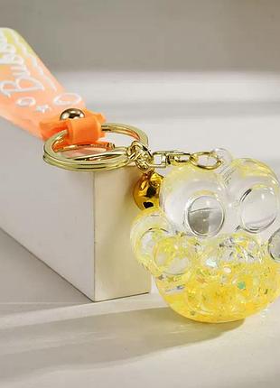 Брелок лапка "bubble" жовта