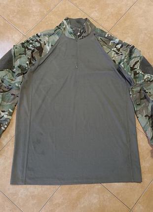 Тактичну сорочка типу ubacs (under body armour combat shirt) з камуфляжними рукавами в стилі multicam/mtp та оливковим торсом.