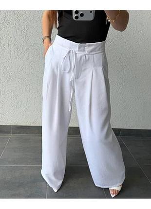 Штани палаццоз високою посадкою. застібається на прихований ґудзик. тканина льон.