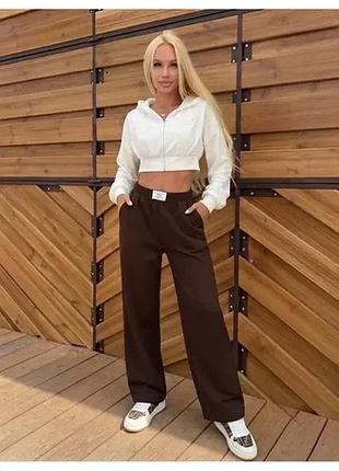 Штани вільного крою з високою посадкою. жіночі. тканина костюмка.