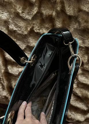 Лакована шкіряна сумуа 10