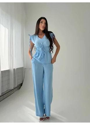 Жіноча костюм, модель 255, креп-жатка, блакитний