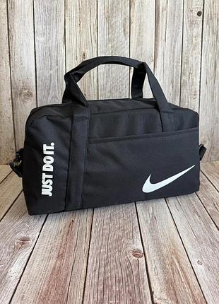 Дорожня сумка nike чорна 50×24×24 см з oxford 1000d для поїздок і спорту
