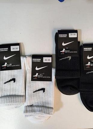 Набір дитячих високих шкарпеток (3 білих + 3 чорні) nike. розмір 30-35