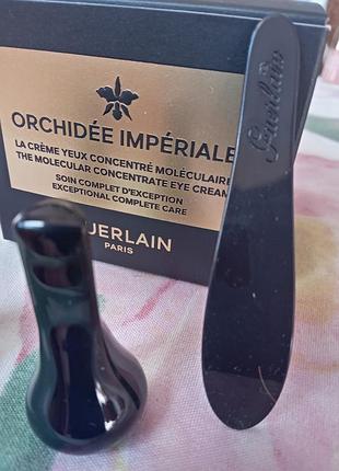 Guerlain массажер под глазами