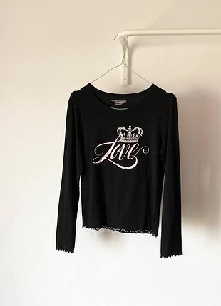Трикотажна чорна футболка з довгим рукавом