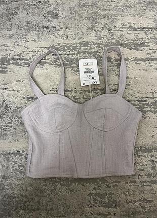 Лавандовий корсетний топ bershka