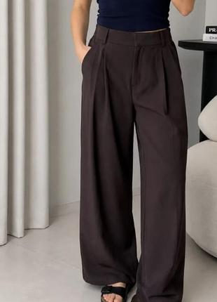 Жіночі штани широкого крою від бренду h&m.