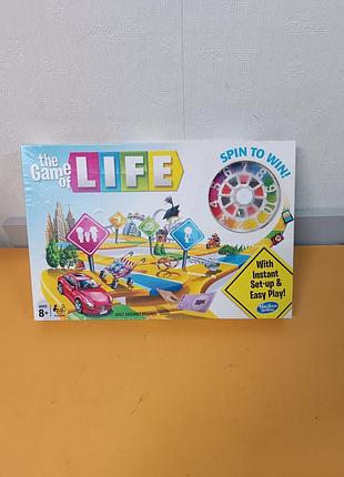Популярна сімейна настільна гра «гра в життя» (the game of life) від бренду hasbro gaming.